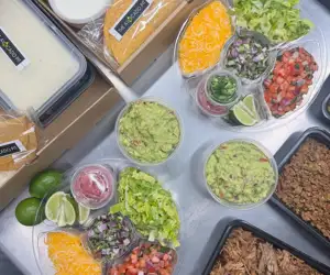 Catered meals setup from The Avocado Pit.